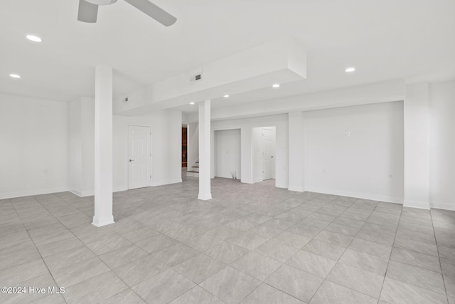 basement featuring ceiling fan