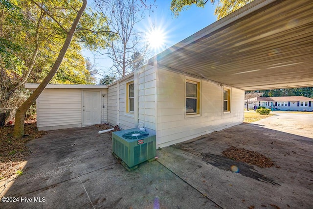 view of property exterior with cooling unit