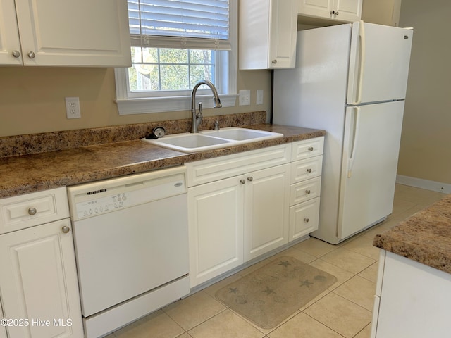 kitchen featuring white cabinetry, white appliances, sink, and light tile patterned floors