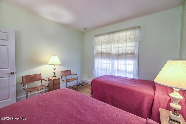 bedroom featuring hardwood / wood-style flooring