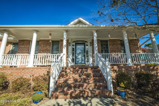 view of front of home featuring covered porch