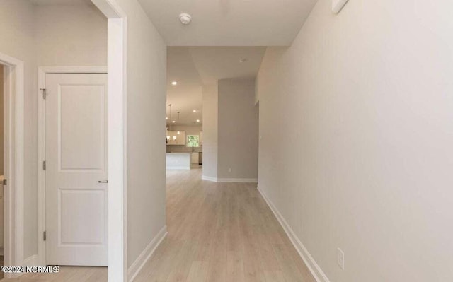 hall featuring light wood-type flooring