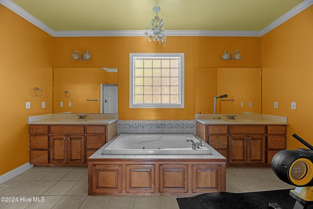 bathroom with tile patterned flooring, a notable chandelier, a bathtub, vanity, and ornamental molding