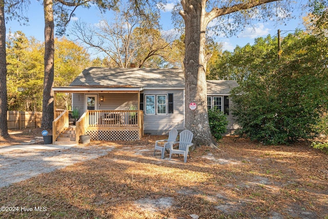 view of front of property featuring a wooden deck