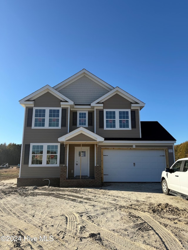 view of front of property featuring a garage