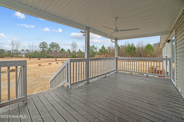 wooden deck with ceiling fan