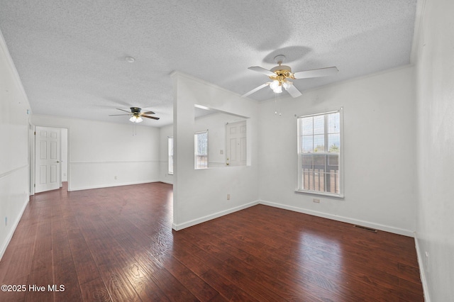 empty room featuring dark hardwood / wood-style floors, a textured ceiling, and ceiling fan