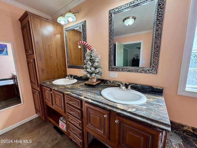 bathroom featuring vanity, tile patterned floors, and ornamental molding