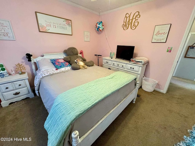 bedroom featuring dark carpet and crown molding