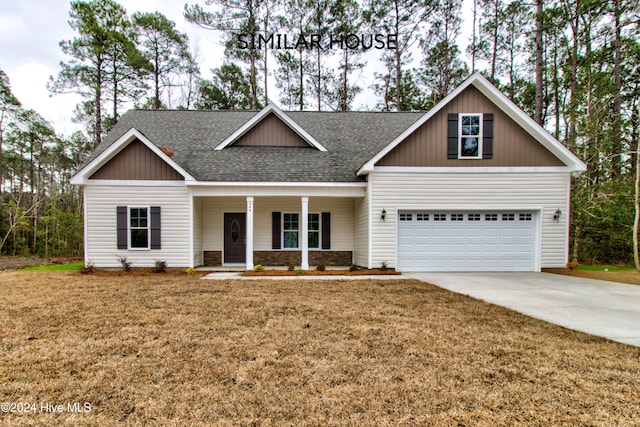 craftsman house with a porch and a garage