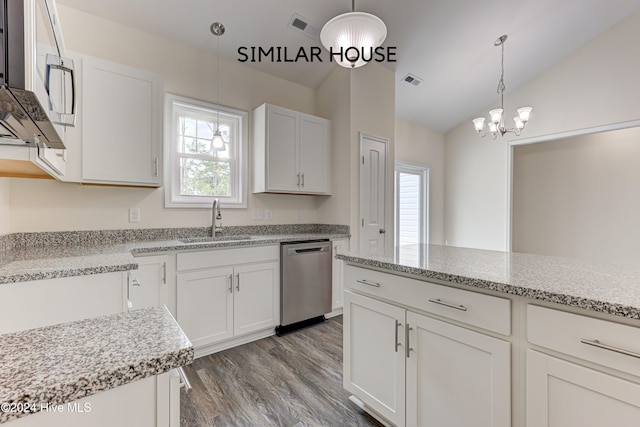 kitchen featuring dishwasher, white cabinets, sink, vaulted ceiling, and wood-type flooring