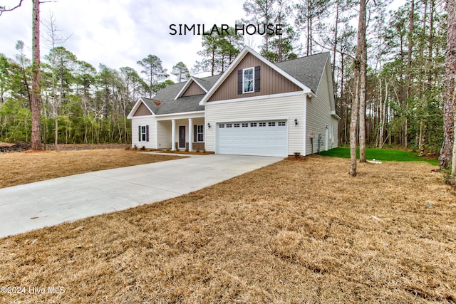 craftsman house with covered porch and a garage