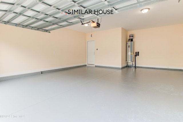 garage featuring water heater and a garage door opener