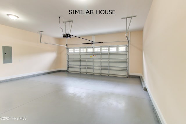 garage with electric panel and a garage door opener