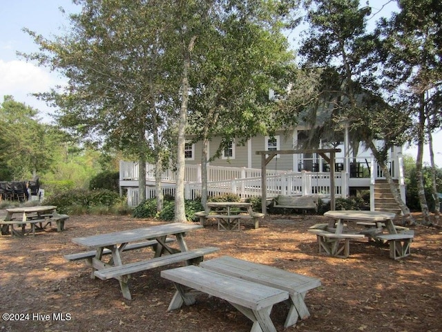 surrounding community featuring a wooden deck