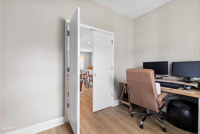 office space featuring light hardwood / wood-style floors