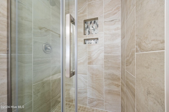 bathroom with an enclosed shower