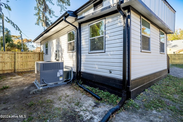 view of property exterior with cooling unit