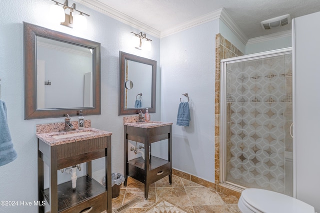 bathroom featuring sink, a textured ceiling, toilet, an enclosed shower, and ornamental molding