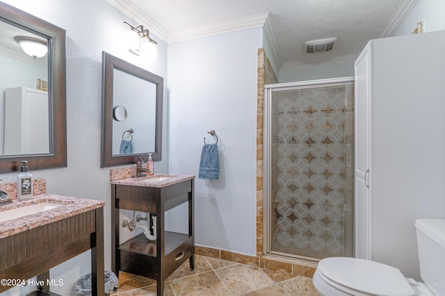 bathroom with tile patterned floors, a shower with shower door, toilet, and ornamental molding