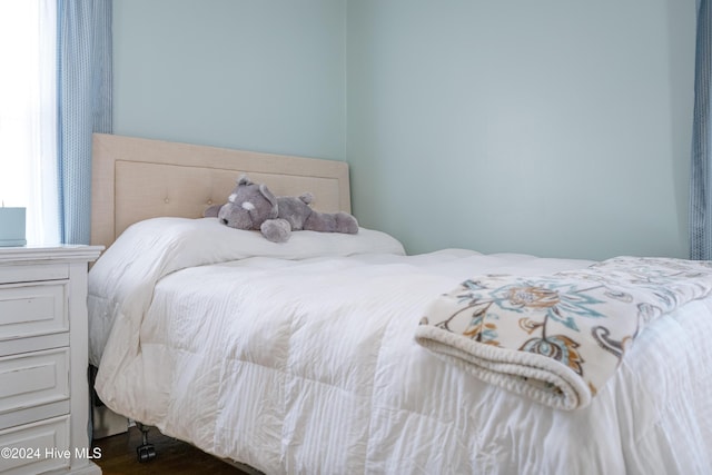 bedroom featuring wood-type flooring