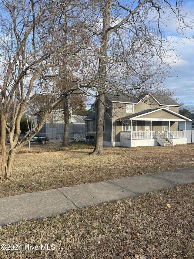 view of front of property featuring covered porch