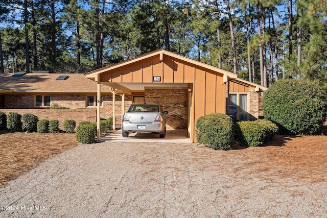 exterior space featuring a carport