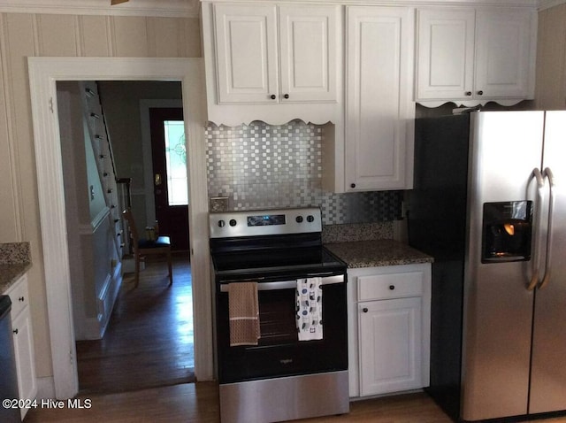 kitchen featuring white cabinets, dark hardwood / wood-style flooring, stainless steel appliances, and stone counters