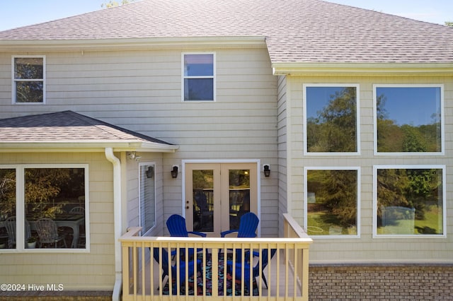 back of property featuring french doors