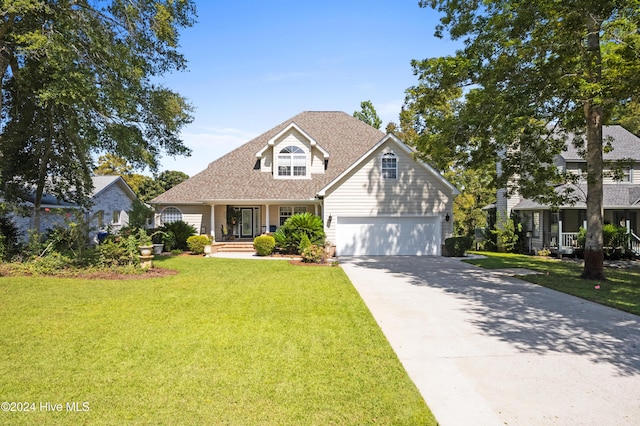 front facade with a front lawn, covered porch, and a garage