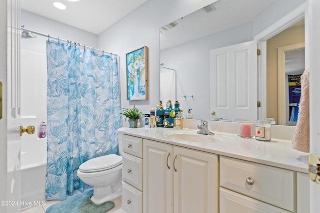 full bathroom featuring tile patterned floors, vanity, toilet, and shower / tub combo with curtain