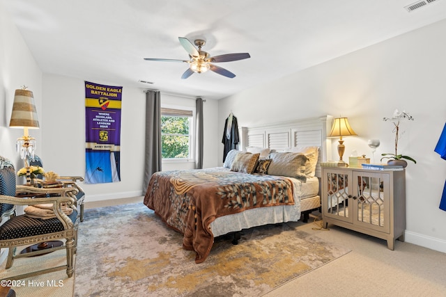 carpeted bedroom featuring ceiling fan