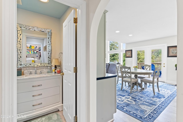 hallway featuring sink