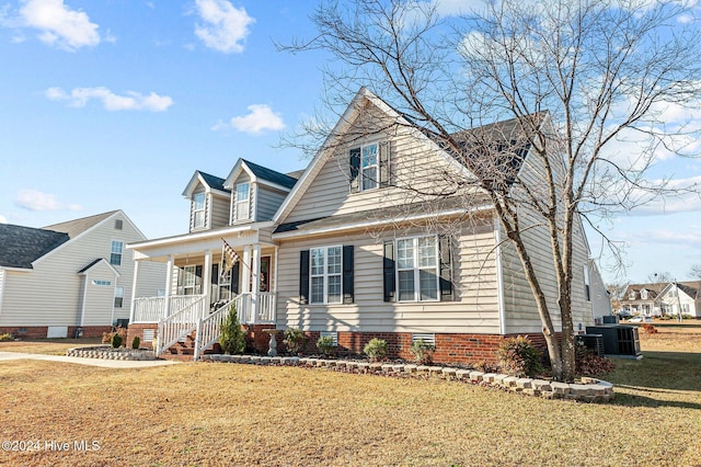 cape cod home with a front yard, a porch, and central air condition unit