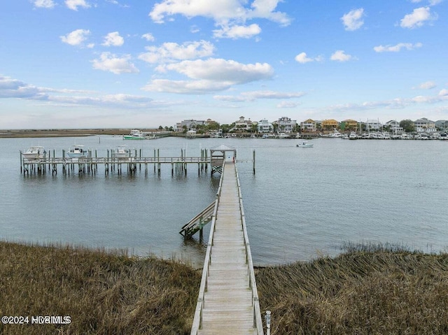 dock area featuring a water view