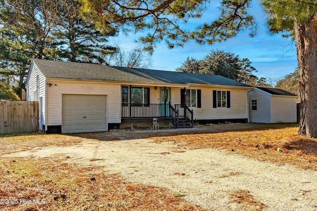 ranch-style house featuring a garage