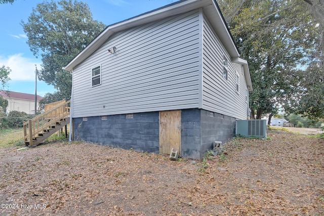 view of property exterior with cooling unit