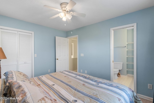 bedroom featuring ceiling fan, a closet, and ensuite bathroom