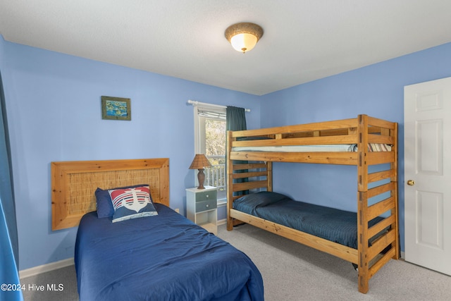 bedroom featuring carpet flooring