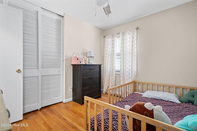 bedroom with hardwood / wood-style flooring and ceiling fan