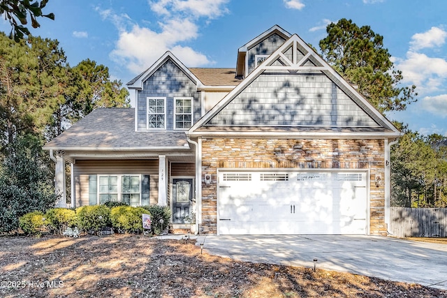 craftsman-style home with a garage