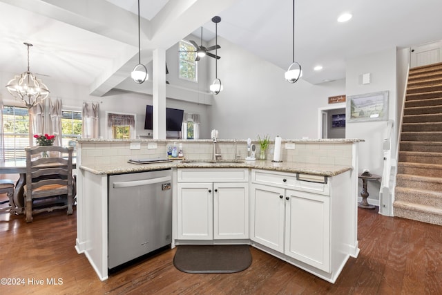 kitchen featuring white cabinetry, dishwasher, tasteful backsplash, and sink