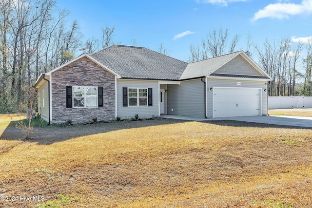 ranch-style home with a garage