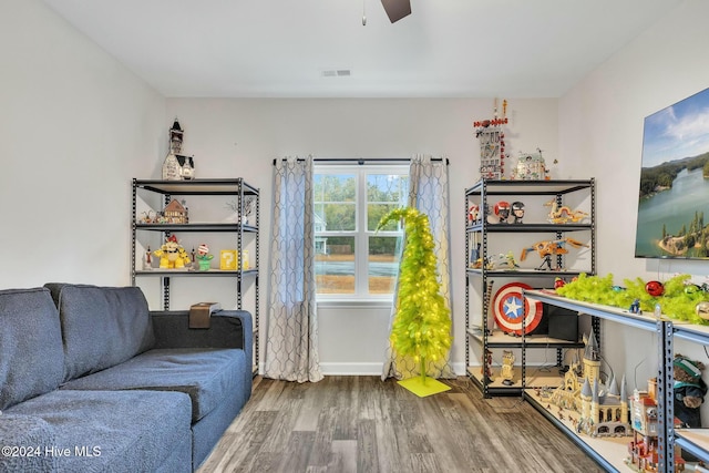 game room featuring hardwood / wood-style floors and ceiling fan