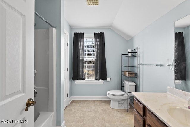 full bathroom featuring toilet, vanity, vaulted ceiling, and  shower combination