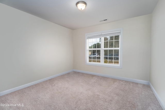 empty room with carpet floors