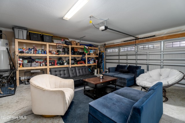 garage featuring water heater and a garage door opener