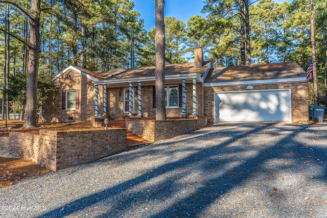 single story home with a garage