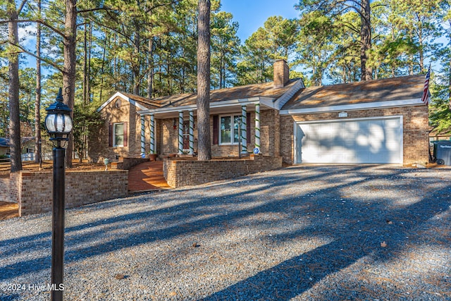 view of front of property with a garage