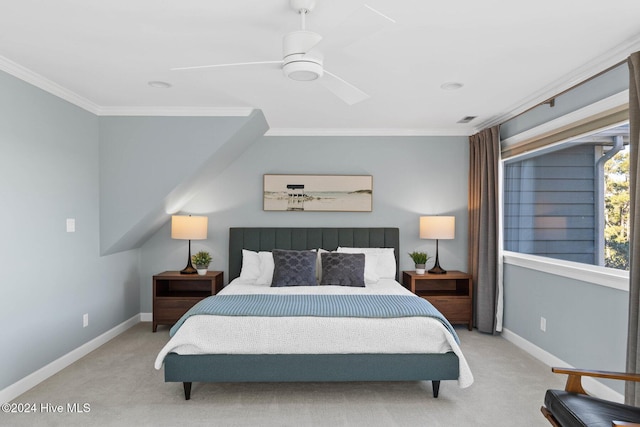 bedroom featuring ceiling fan, light colored carpet, and crown molding